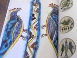 an open book with a picture of a bird on it
