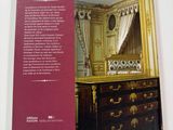 the back cover of a book with a picture of a bed in a room