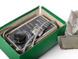 a green box with some tools inside of it