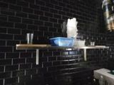 a kitchen with a sink and a stove in it
