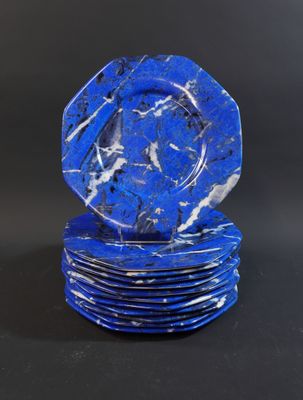 blue and white marble plates stacked on top of each other