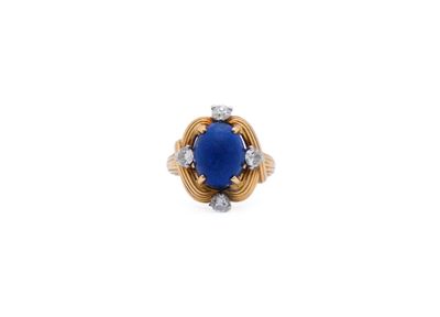 a blue stone and diamond ring