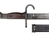a knife that is laying on the ground next to a knife