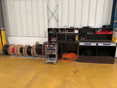 many different types of electrical equipment in this garage