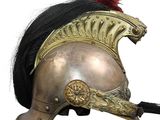 helmet of a roman soldier on a white background with a red pom pom