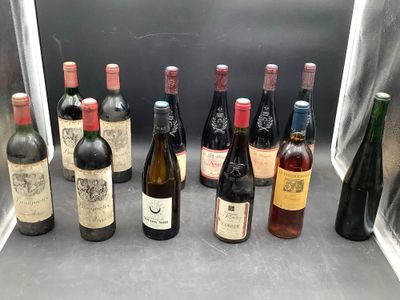 several bottles of wine are lined up on a counter