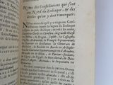 an open book that has a picture of a cat on it