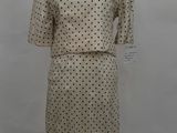 a mannequin dress with polka dots on a mannequin mannequin