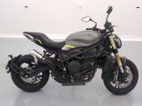a picture of a motorcycle that is parked in a room