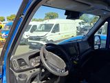 a view of the inside of a van from the driver ' s seat