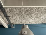a light that is hanging from the ceiling in the room