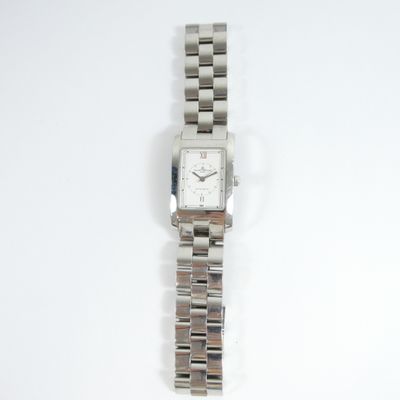 an image of a close up of a wrist watch on a white surface