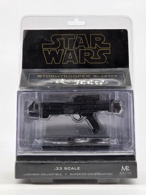 a close up of a toy gun on a white background