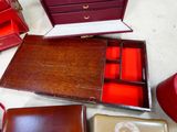 many different types of leather boxes on the floor