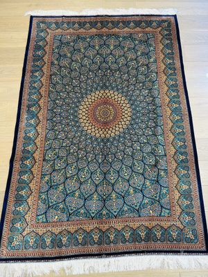 Tapis Iran centre médaillon fond bleu 225 x 150