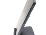a cell phone that is sitting on top of a stand