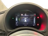 the dashboard of a car with a digital display in the center