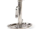 a silver plate with a handle and a handle on it