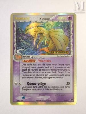 a close up of a card with a dragon on it