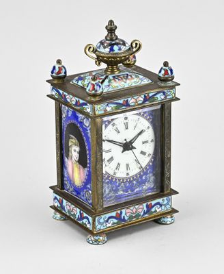 a clock that has a picture of a woman on it