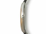 a close up of a watch on a white surface