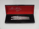 a close up of a pen in a box on a table