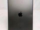 a close up of the back of an ipad on a white surface