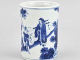 blue and white porcelain cup with a scene of a man and a woman
