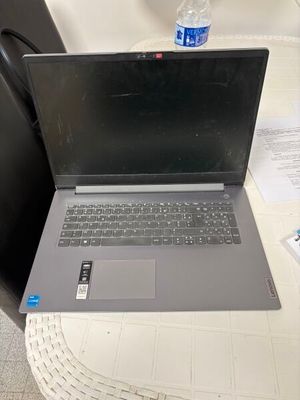 a laptop computer sitting on top of a table