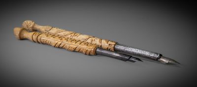 a pen that is sitting on top of a table