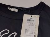 a t - shirt with a picture of an octopus on it