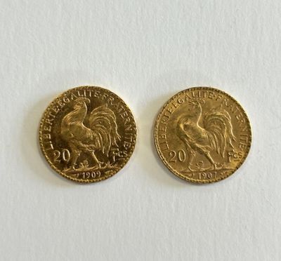 two pieces of gold coin with a rooster on the front and a rooster on the back