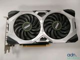 a close up of a video card with two fans on it