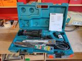 a blue tool case with tools in it on a table