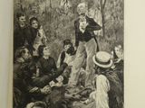 an old picture of a group of people sitting in a forest