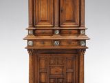 an old wooden cabinet with two drawers and a door