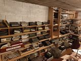 a room full of old typewriters and other electronic equipment