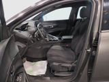the interior of a car with the door open and the passenger seat down
