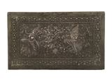 a metal plaque with birds and flowers on it