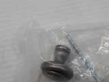 an image of a screw and a screw in a plastic bag