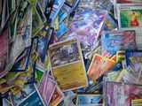 many different types of pokemon cards in a box