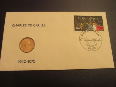 an envelope with a coin on it sitting on top of a table