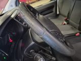 a close up of a steering wheel in a car