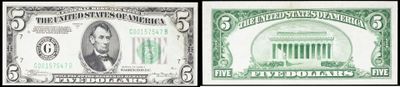 un gros plan sur un billet d'un dollar vert et blanc
