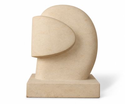 the sculpture is made out of stone and has a curved shape