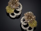 a pair of yellow and white diamond earrings