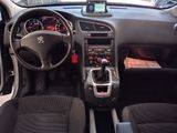 the interior of a car with a dashboard and steering controls