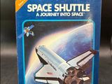 an image of a box with a space shuttle on top of it