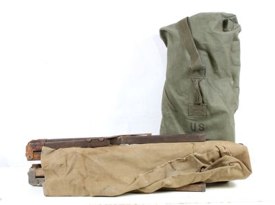 a bag and a piece of luggage sitting on a table