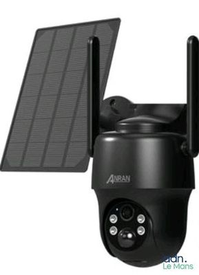 an image of a solar powered security camera mounted on a wall